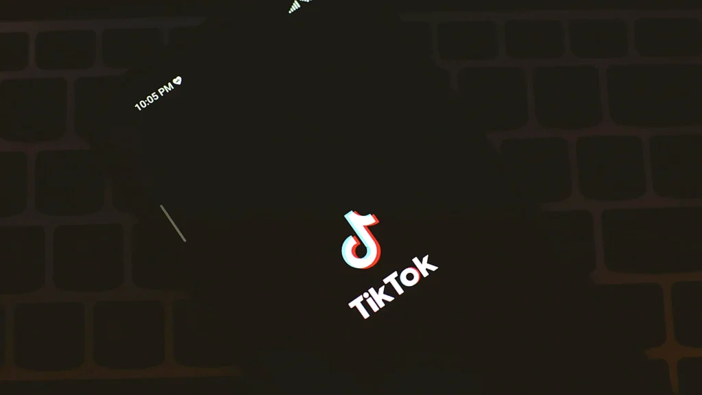 Person creating TikTok username on smartphone showing character requirements by using quick counter tools tool.